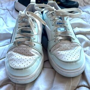 Blue teel and white pumas side 5 new and did not fit at all worn once